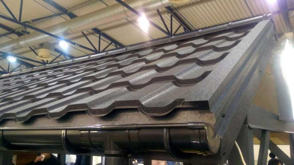 Стенд зі зразком металочерепиці Статус